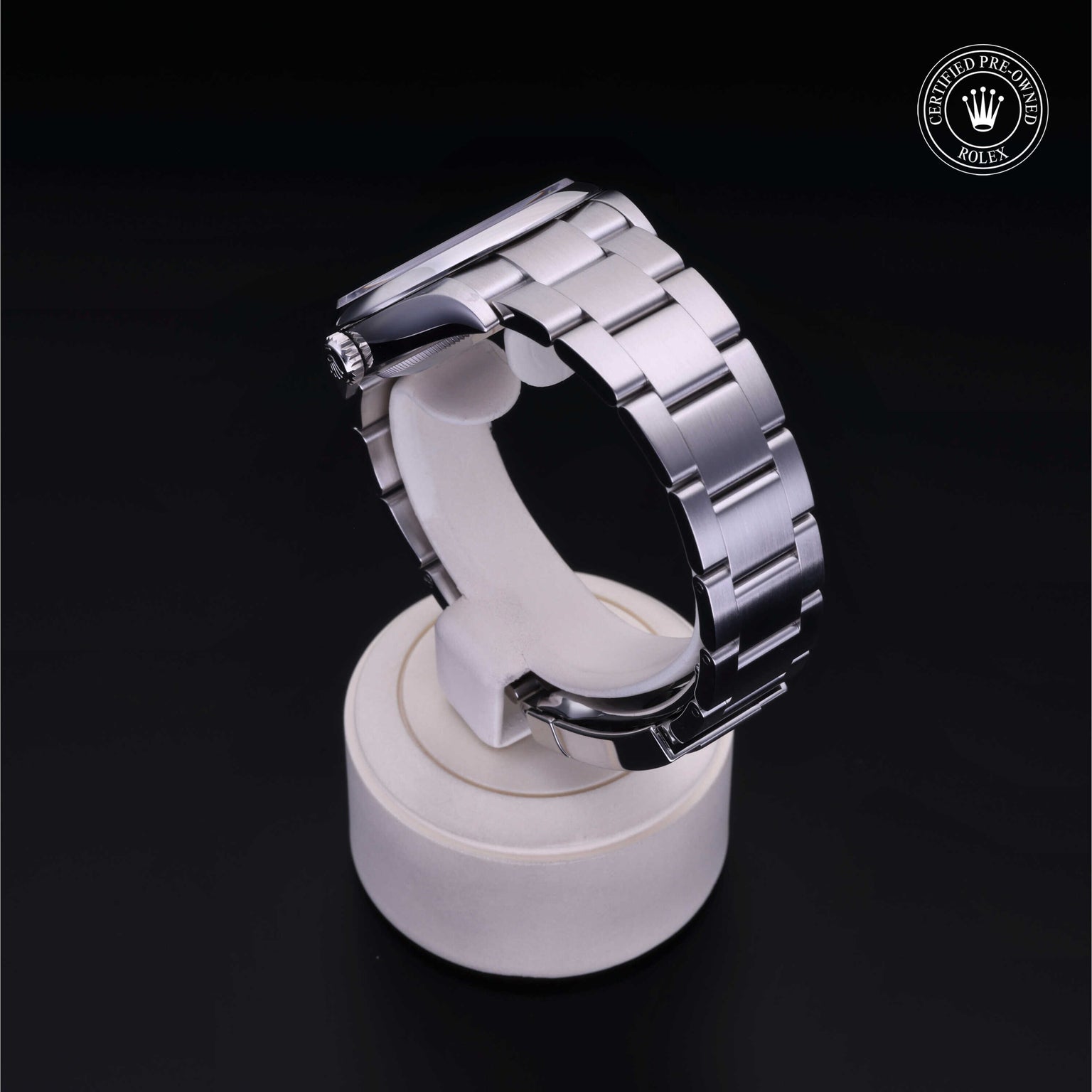 Rolex Certified Pre-owned Oyster Perpetual M126000-0014 front on black background