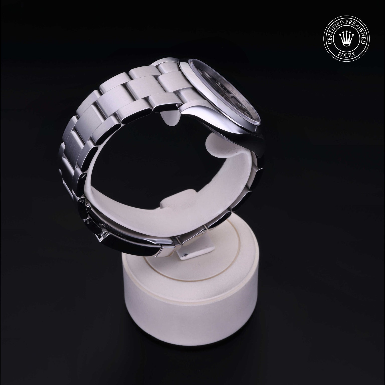 Rolex Certified Pre-owned Oyster Perpetual M126000-0014 front on black background