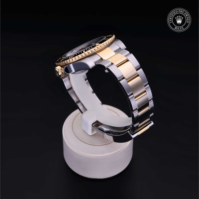 Rolex Certified Pre-owned Submariner M116613LN-0001 front on black background