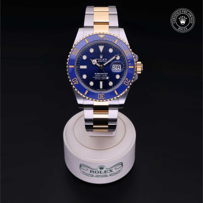 Rolex Certified Pre-owned Submariner M126613LB-0002 front on black background