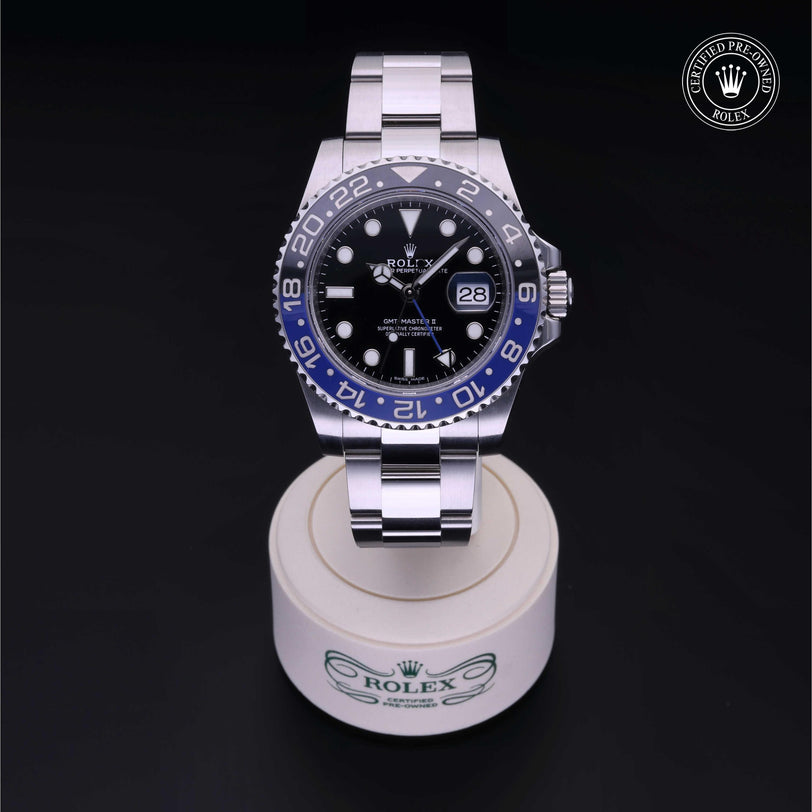 Rolex Certified Pre-owned GMT M116710BLNR-0002 front on black background