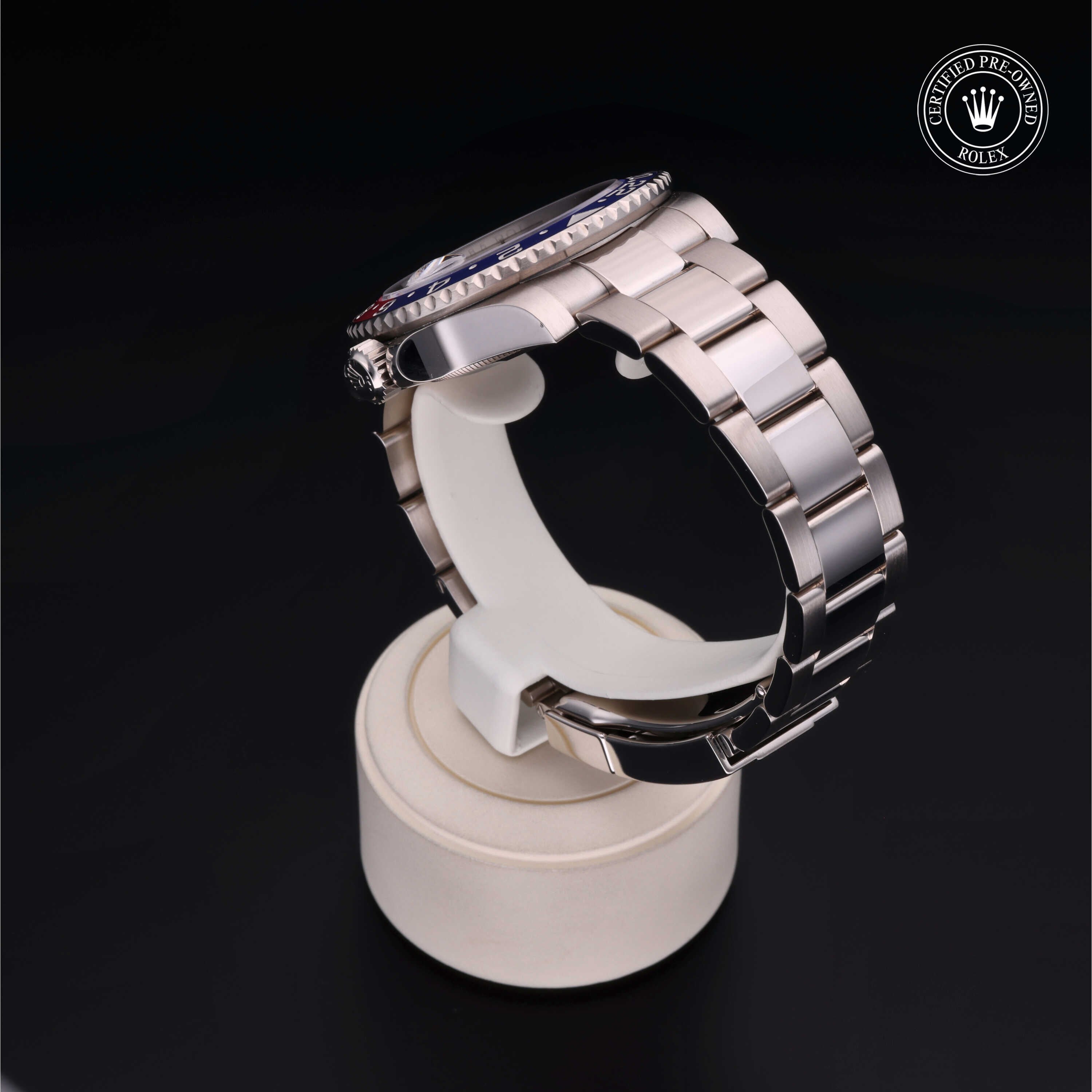 Rolex Certified Pre-owned GMT M126719BLRO-0003 front on black background