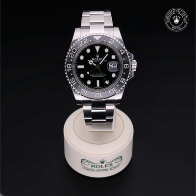 Rolex Certified Pre-owned GMT M116710LN-0001 front on black background