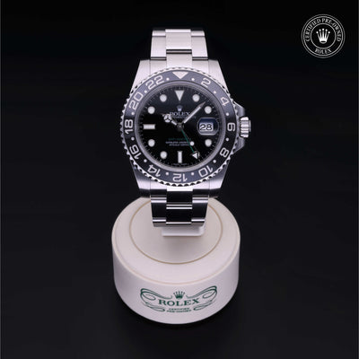 Rolex Certified Pre-owned GMT M116710LN-0001 front on black background