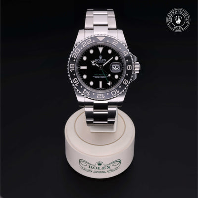 Rolex Certified Pre-owned GMT M116710LN-0001 front on black background
