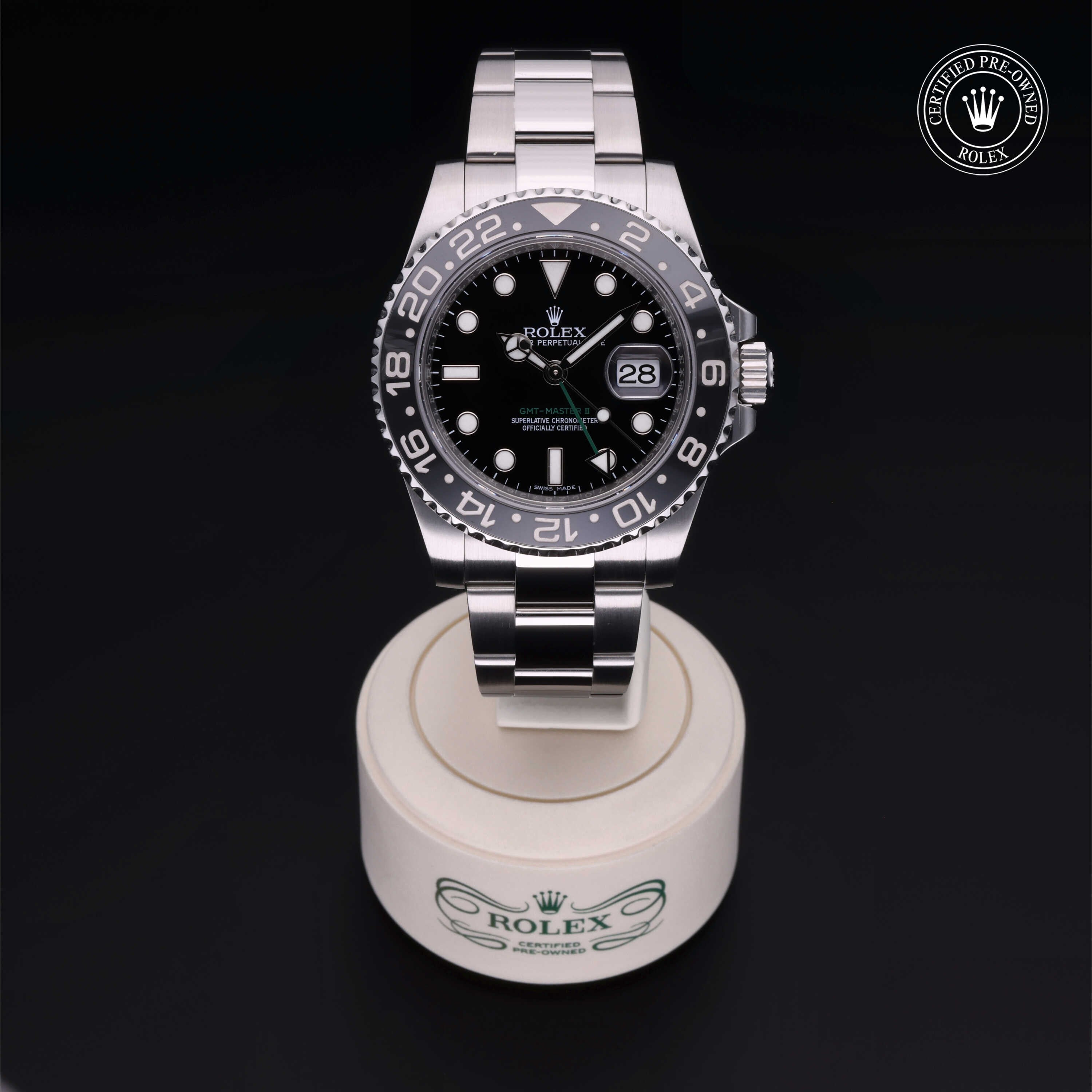 Rolex Certified Pre-owned GMT M116710LN-0001 front on black background