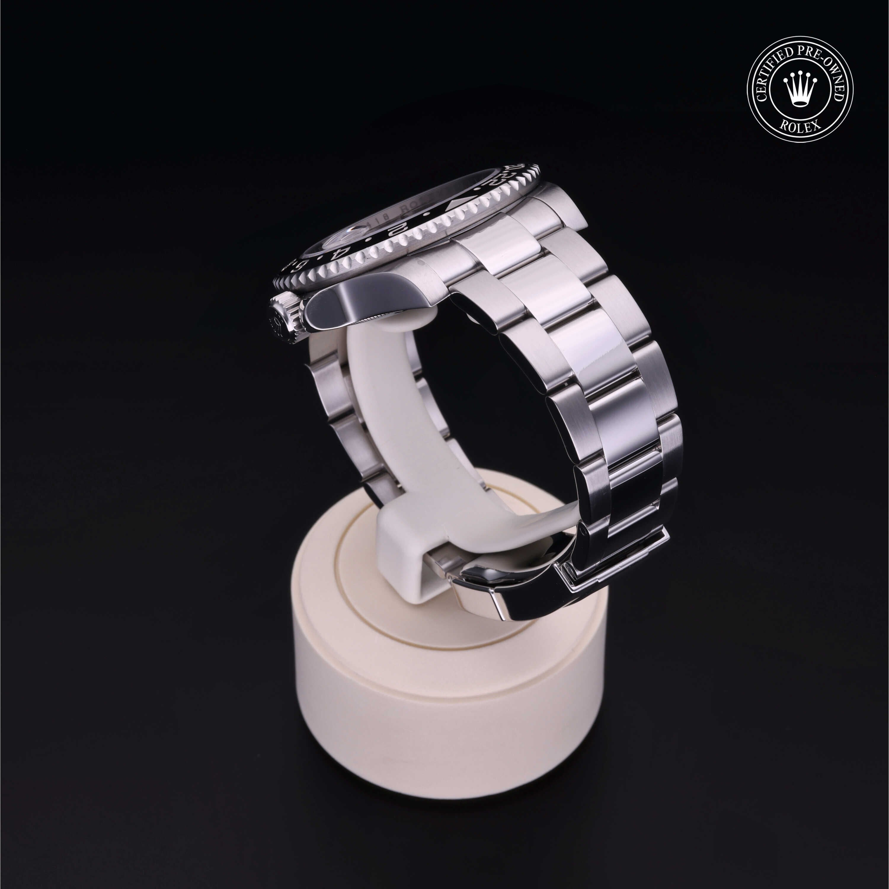 Rolex Certified Pre-owned GMT M116710LN-0001 front on black background