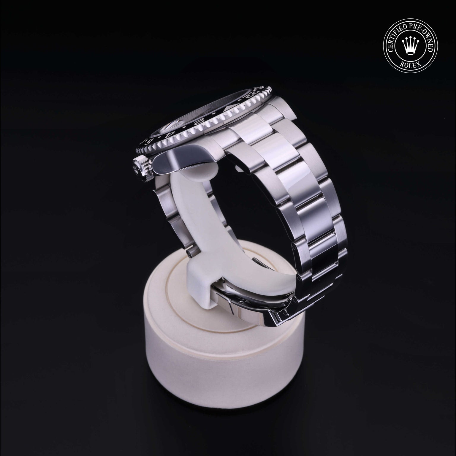 Rolex Certified Pre-owned GMT M116710LN-0001 front on black background