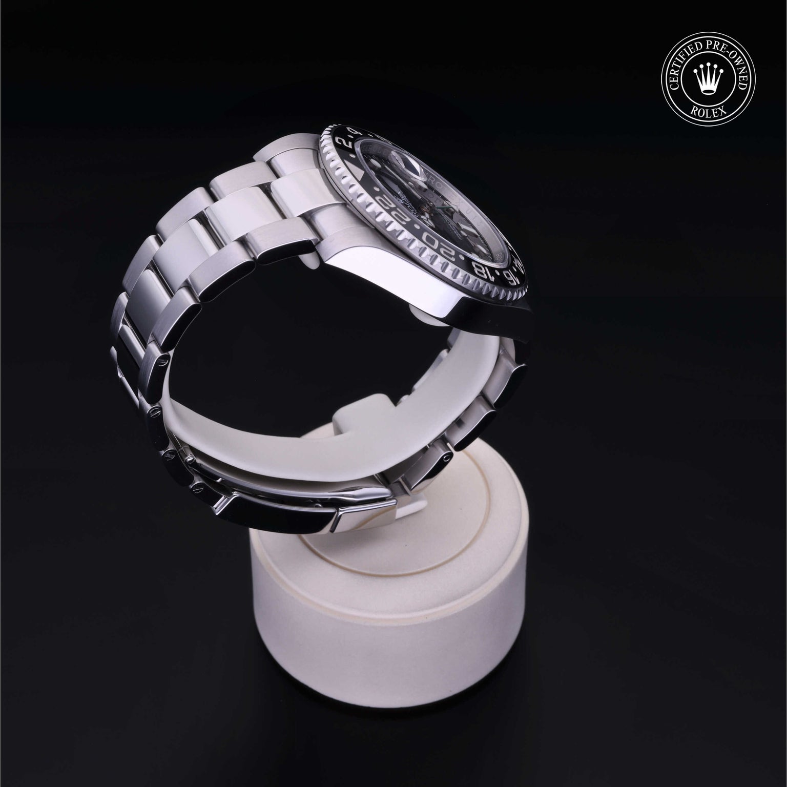 Rolex Certified Pre-owned GMT M116710LN-0001 front on black background