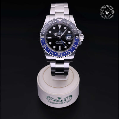 Rolex Certified Pre-owned GMT M116710BLNR-0002 front on black background