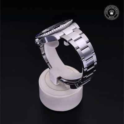Rolex Certified Pre-owned GMT M116710BLNR-0002 front on black background