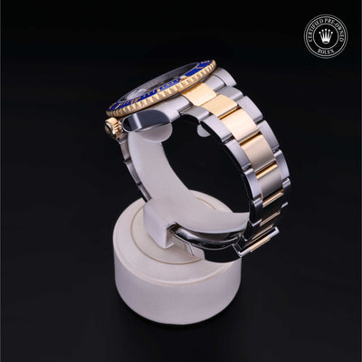 Rolex Certified Pre-owned Submariner M116613LB-0005 front on black background