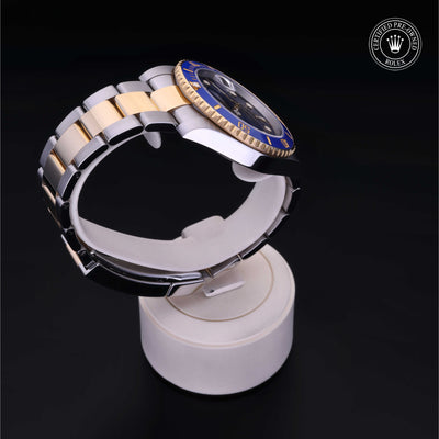 Rolex Certified Pre-owned Submariner M116613LB-0005 front on black background