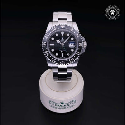 Rolex Certified Pre-owned GMT M116710LN-0001 front on black background