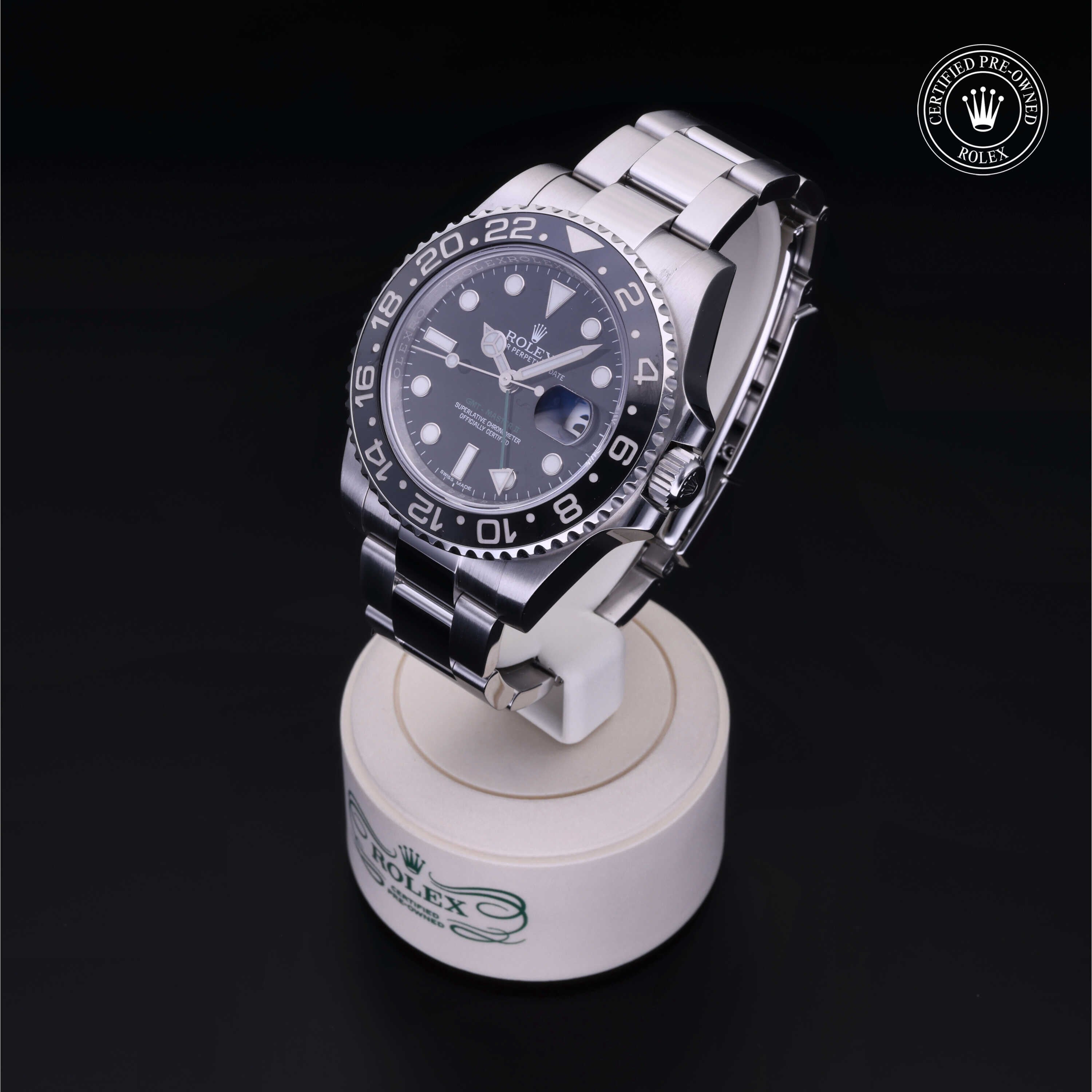Rolex Certified Pre-owned GMT M116710LN-0001 front on black background