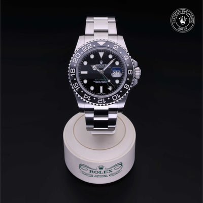 Rolex Certified Pre-owned GMT M116710LN-0001 front on black background