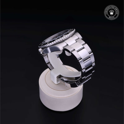 Rolex Certified Pre-owned GMT M116710LN-0001 front on black background