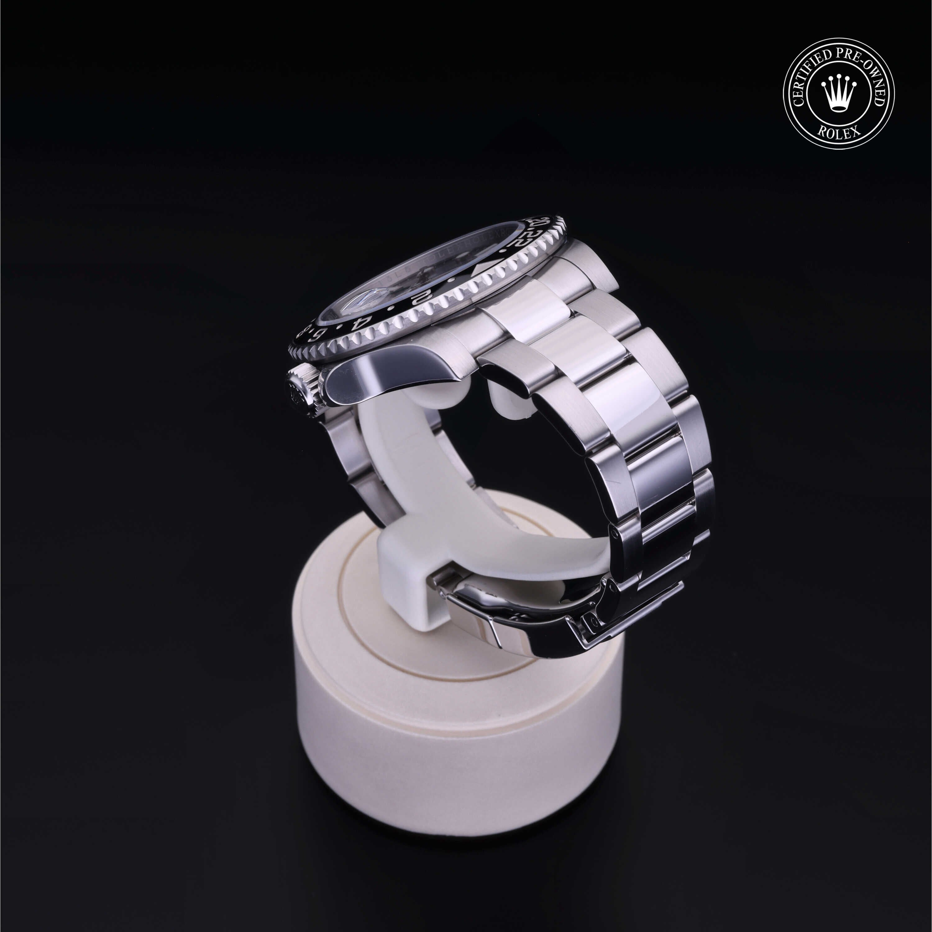 Rolex Certified Pre-owned GMT M116710LN-0001 front on black background