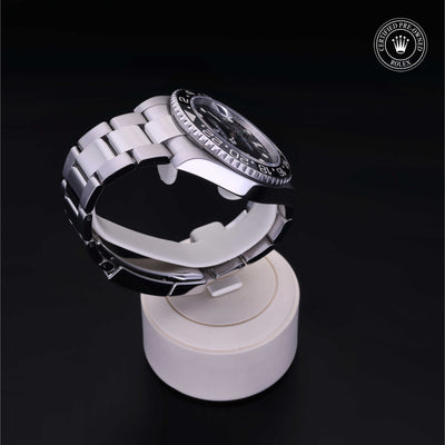 Rolex Certified Pre-owned GMT M116710LN-0001 front on black background