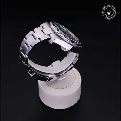 Rolex Certified Pre-owned GMT M116710LN-0001 front on black background