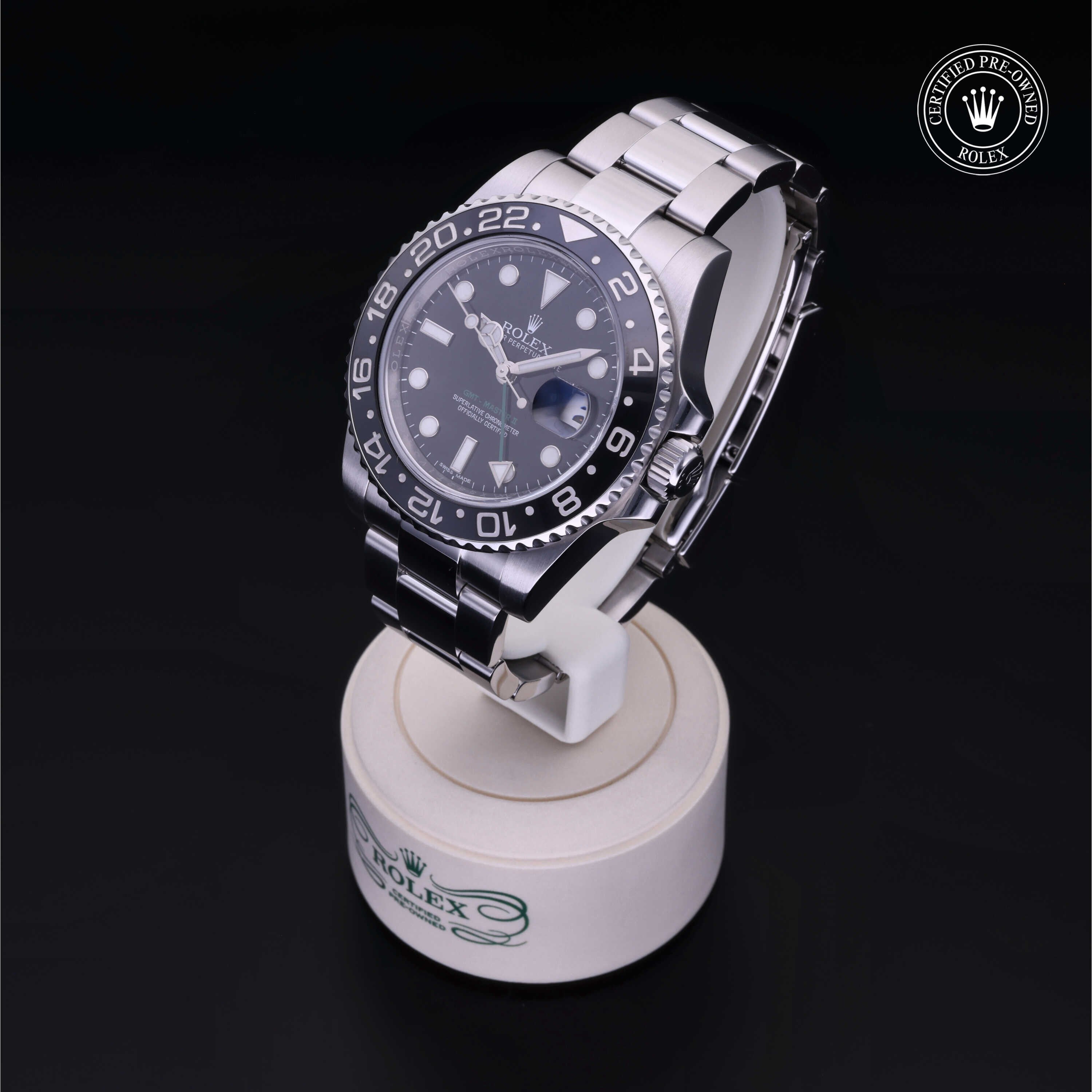 Rolex Certified Pre-owned GMT M116710LN-0001 front on black background