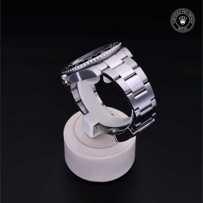 Rolex Certified Pre-owned GMT M116710LN-0001 front on black background
