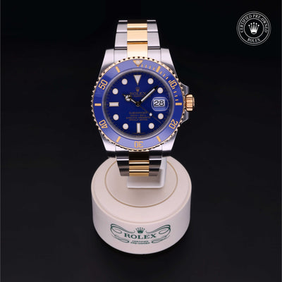 Rolex Certified Pre-owned Submariner M116613LB-0001 front on black background