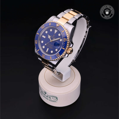 Rolex Certified Pre-owned Submariner M116613LB-0001 front on black background