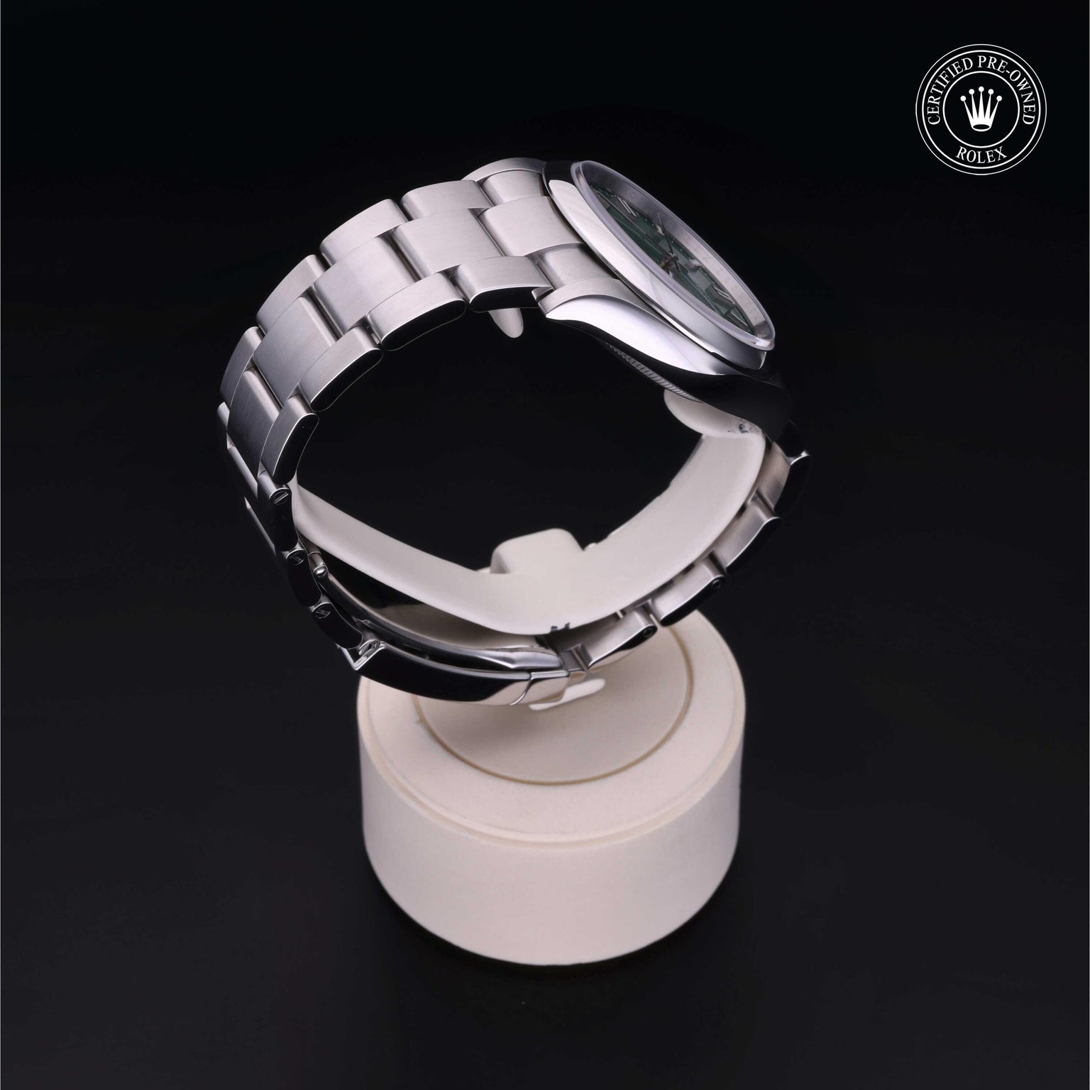 Rolex CPO Oyster Perpetual M126000 front on white background