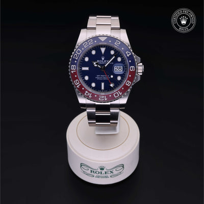 Rolex Certified Pre-owned GMT M126719BLRO-0003 front on black background