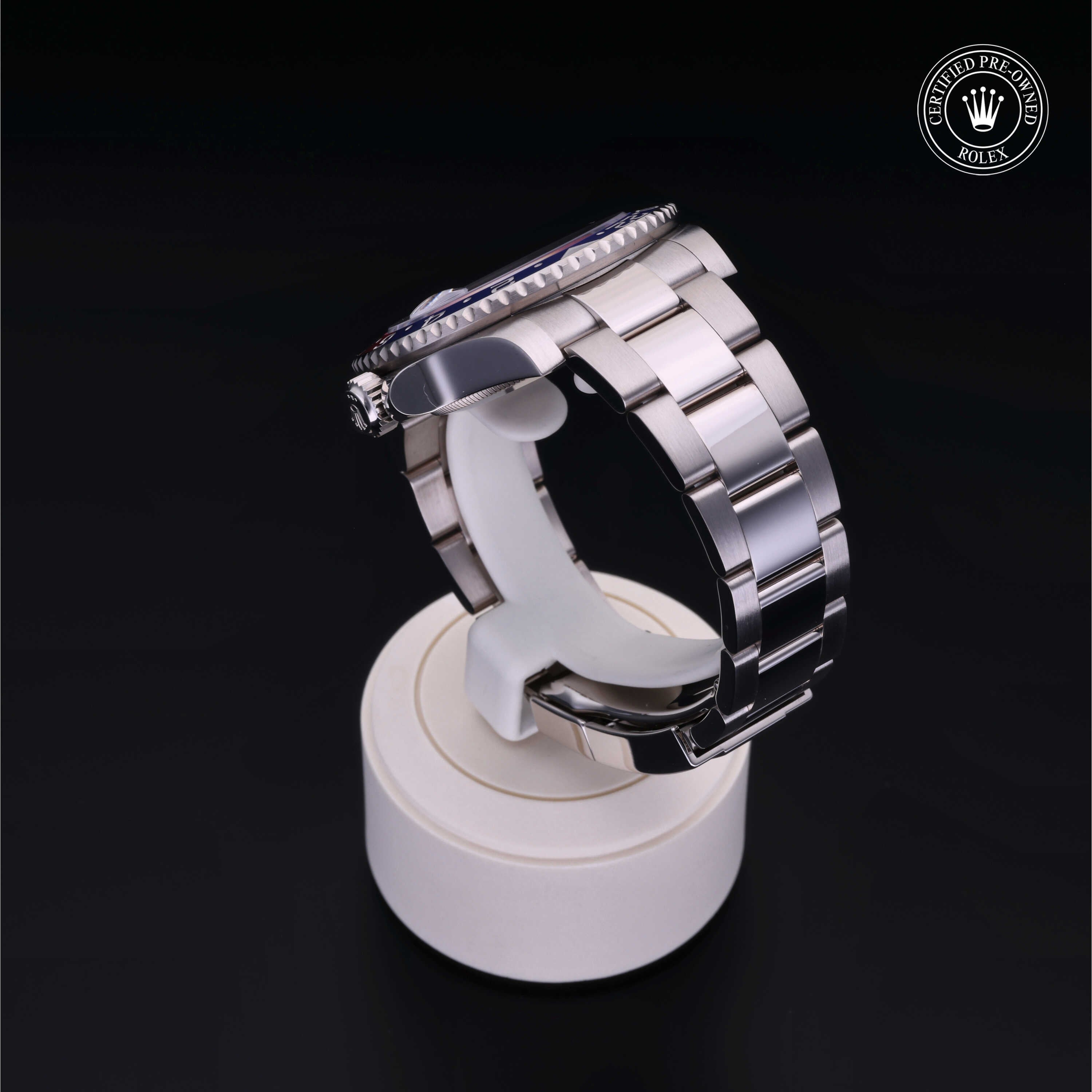 Rolex Certified Pre-owned GMT M126719BLRO-0003 front on black background