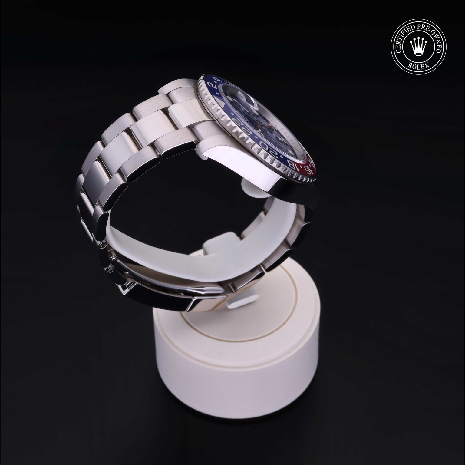 Rolex Certified Pre-owned GMT M126719BLRO-0003 front on black background