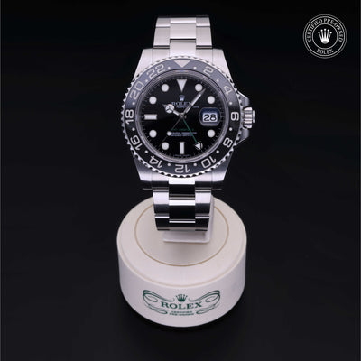 Rolex Certified Pre-owned GMT M116710LN-0001 front on black background