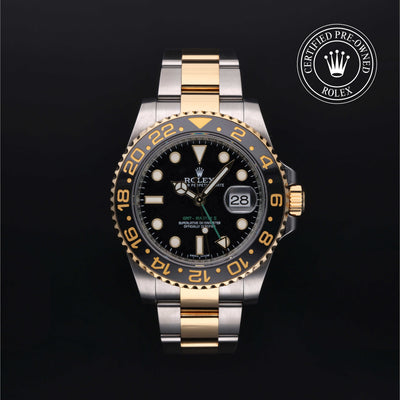 Rolex Certified Pre-owned GMT M116713LN-0001 front on black background