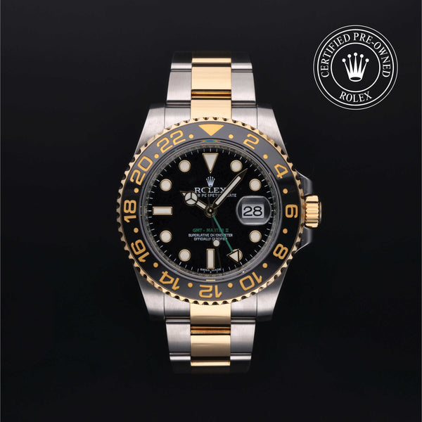 Rolex Certified Pre-owned GMT M116713LN-0001 front on black background