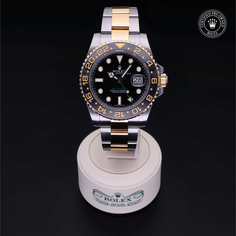 Rolex Certified Pre-owned GMT M116713LN-0001 front on black background
