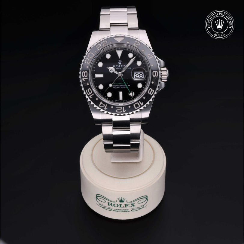Rolex Certified Pre-owned GMT M116710LN-0001 front on black background