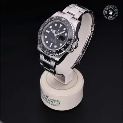 Rolex Certified Pre-owned GMT M116710LN-0001 front on black background