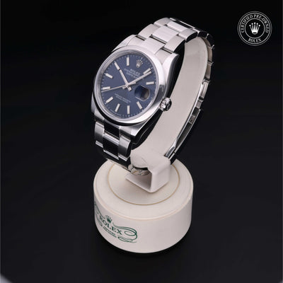 Rolex Certified Pre-owned Datejust M126200-0006 front on black background