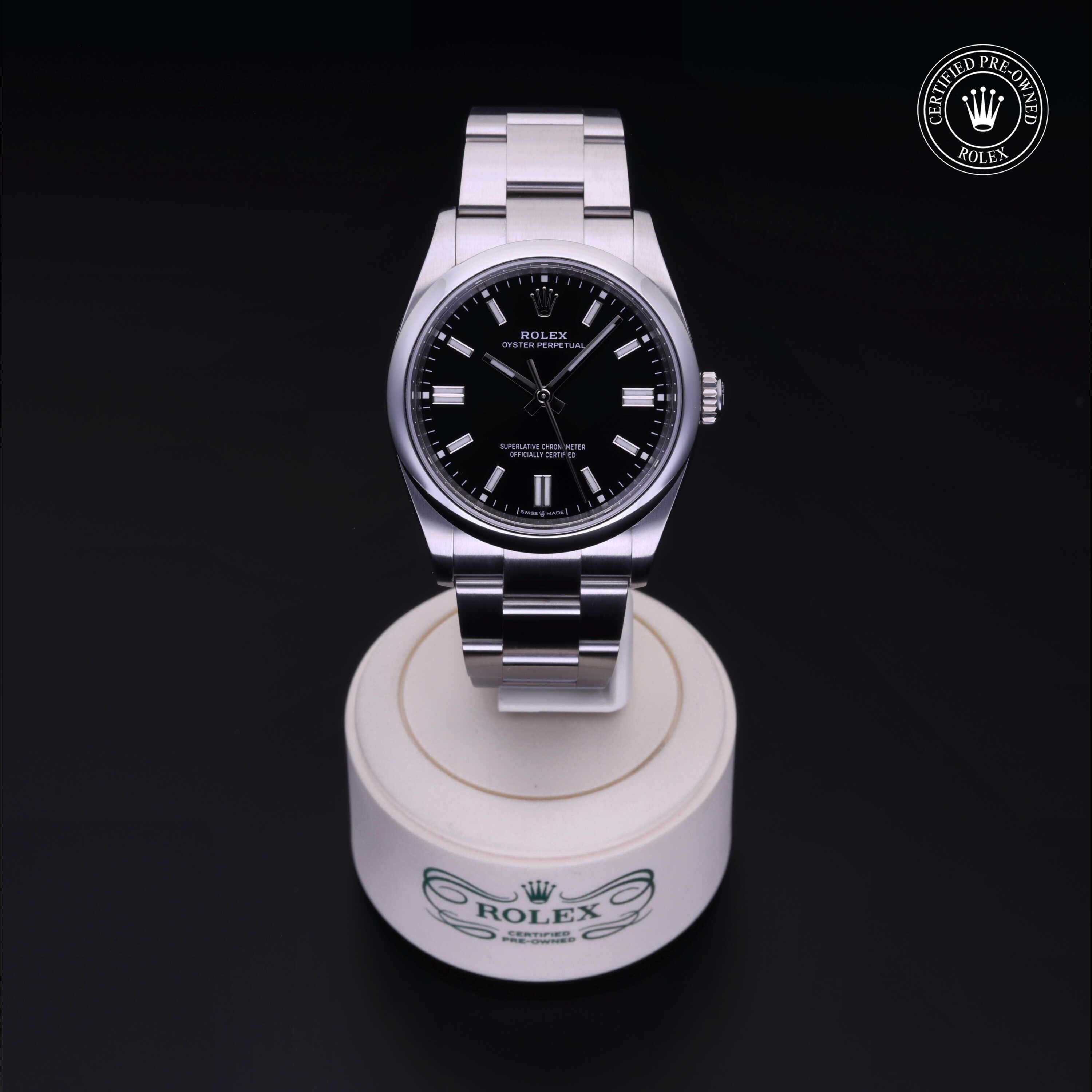 Rolex CPO Oyster Perpetual M126000 front on white background