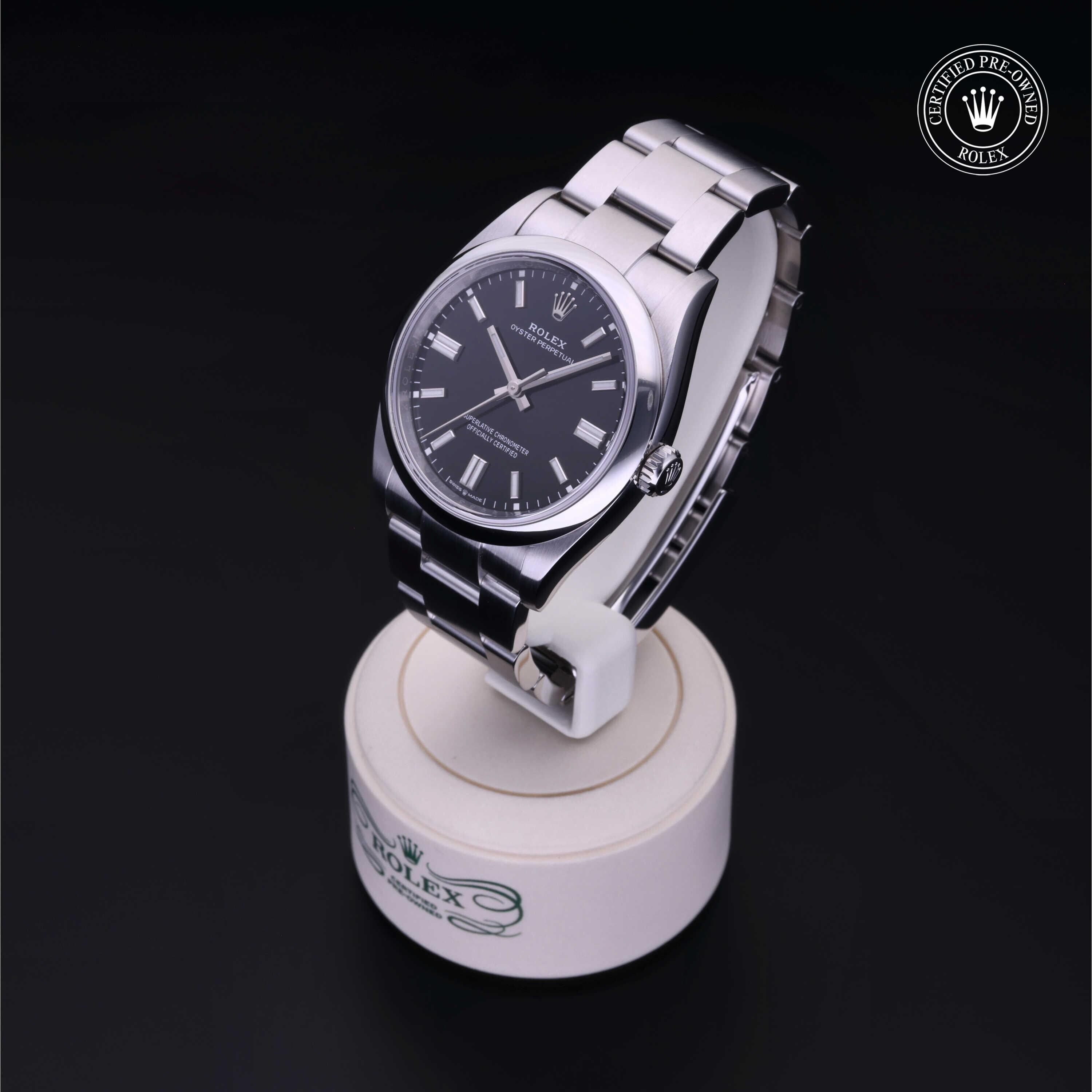 Rolex CPO Oyster Perpetual M126000 front on white background