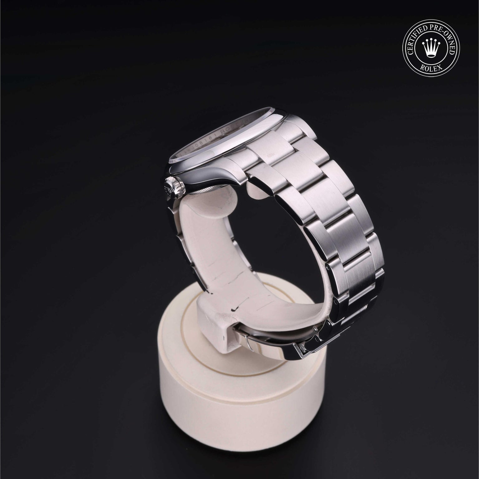 Rolex Certified Pre-owned Oyster Perpetual M116000-0001 front on black background