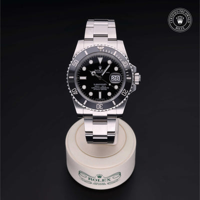 Rolex Certified Pre-owned Submariner M116610LN-0001 front on black background