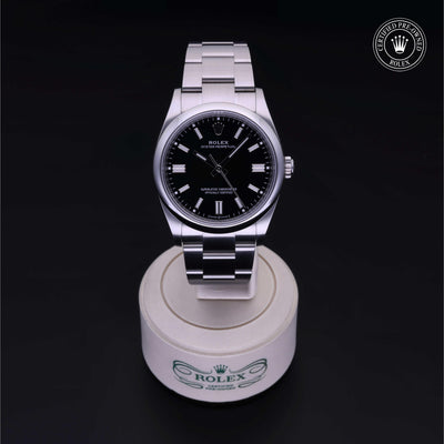 Rolex Certified Pre-owned Oyster Perpetual M126000-0014 front on black background