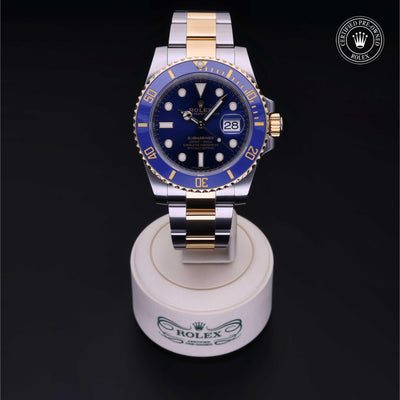 Rolex Certified Pre-owned Submariner M116613LB-0005 front on black background