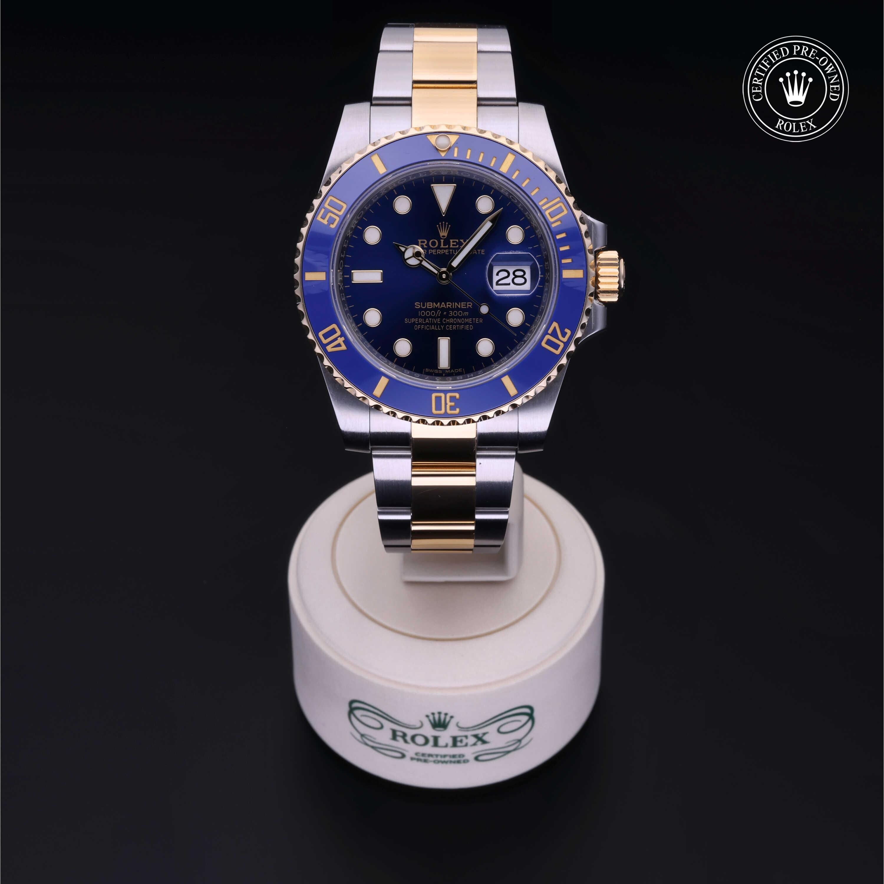 Rolex Certified Pre-owned Submariner M116613LB-0005 front on black background