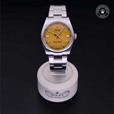 Rolex Certified Pre-owned Oyster Perpetual M126000-0004 front on black background