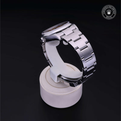 Rolex Certified Pre-owned Oyster Perpetual M126000-0004 front on black background