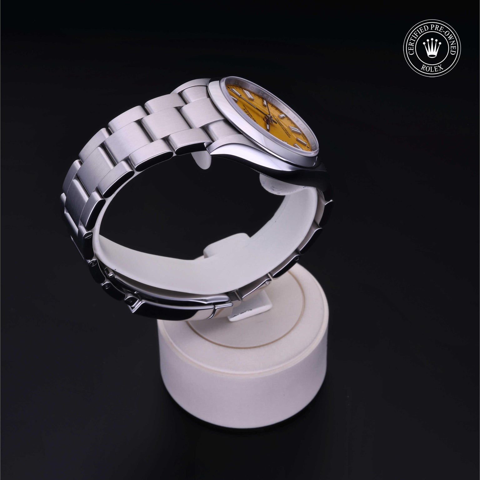 Rolex Certified Pre-owned Oyster Perpetual M126000-0004 front on black background