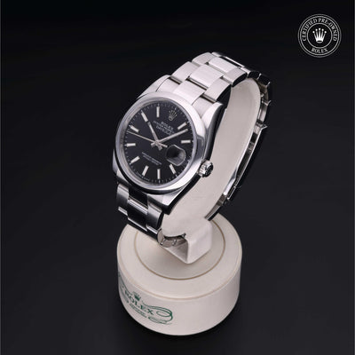 Rolex Certified Pre-owned Datejust M126200-0004 front on black background